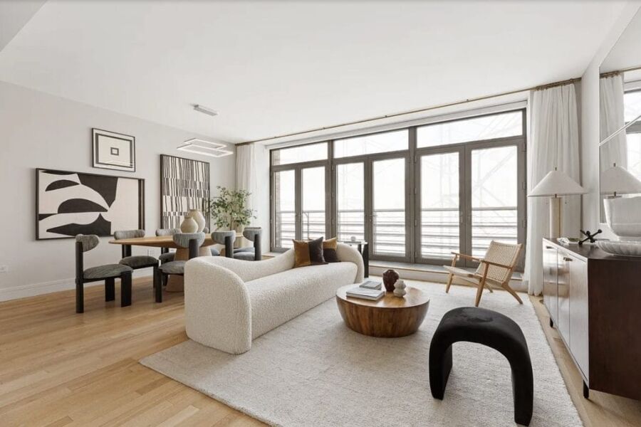 Interior design trends 2026 applied in a contemporary living & dining room by Decorilla designer, Leanna S.